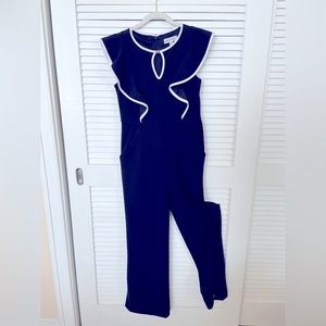 Shelby & Palmer women’s ruffled sleeveless navy jumpsuit. Size 4